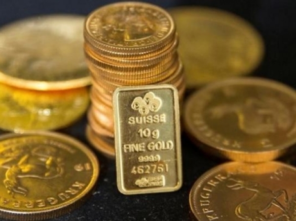 सोना फिसला, डॉलर 14 साल के उच्चतम स्तर पर